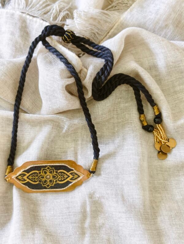 Black and Gold Choker with Gold Artwork